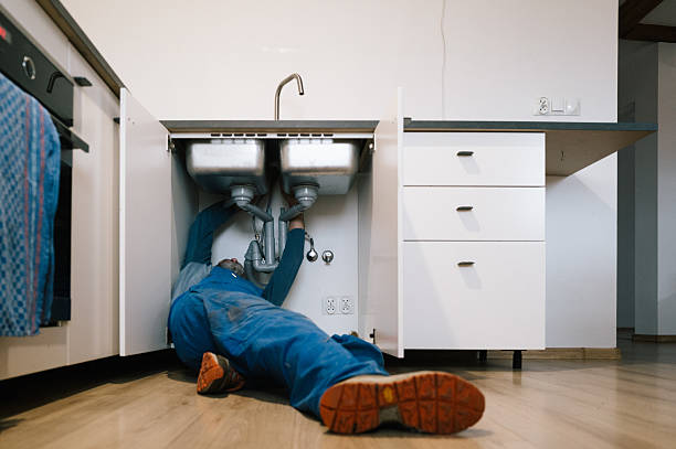 Professional Drain Cleaning technician working in Quincy, MA